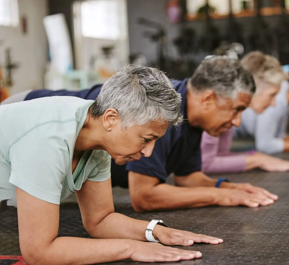 mature men and women in active bodies group class